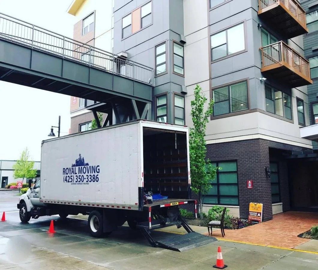 The Royal Moving truck parked at an apartment building
